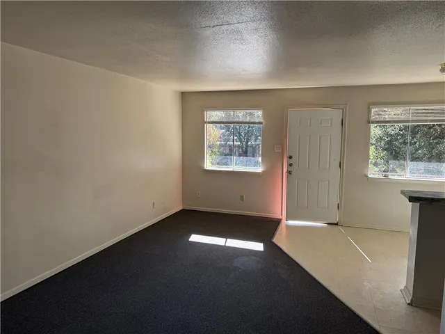 an empty room with windows