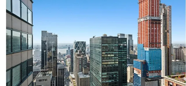 a city view with tall buildings