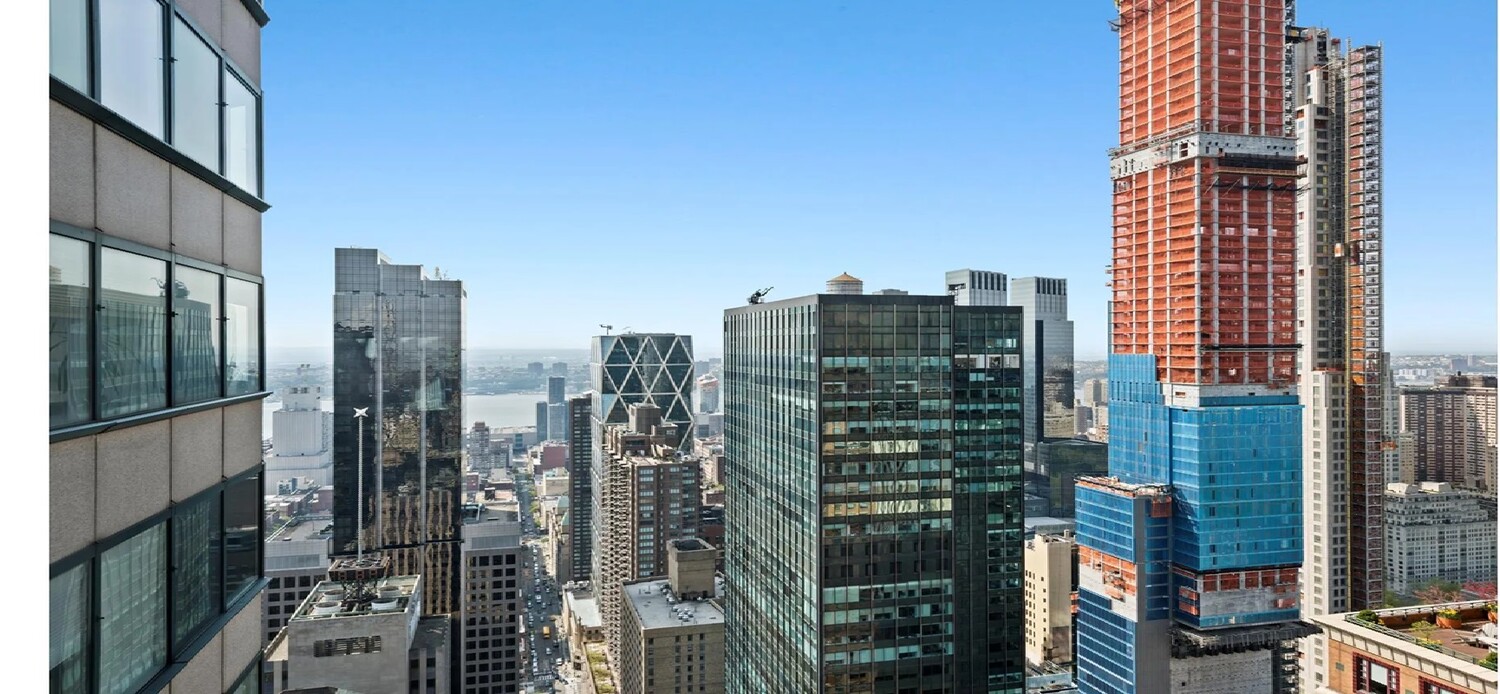 150 West 56th Street, Unit 4003 Manhattan, NY 10019 - Photo 4 of 11 a city view with tall buildings