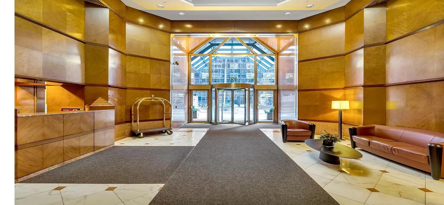 150 West 56th Street, Unit 4003 Manhattan, NY 10019 - Photo 9 of 11 a living room with furniture