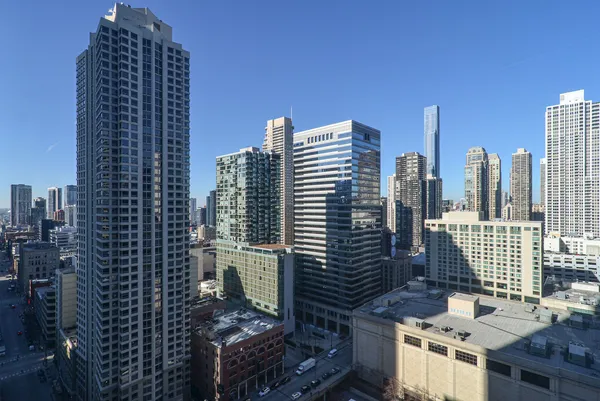 a view of a city with tall buildings