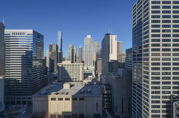 a view of a city with tall buildings