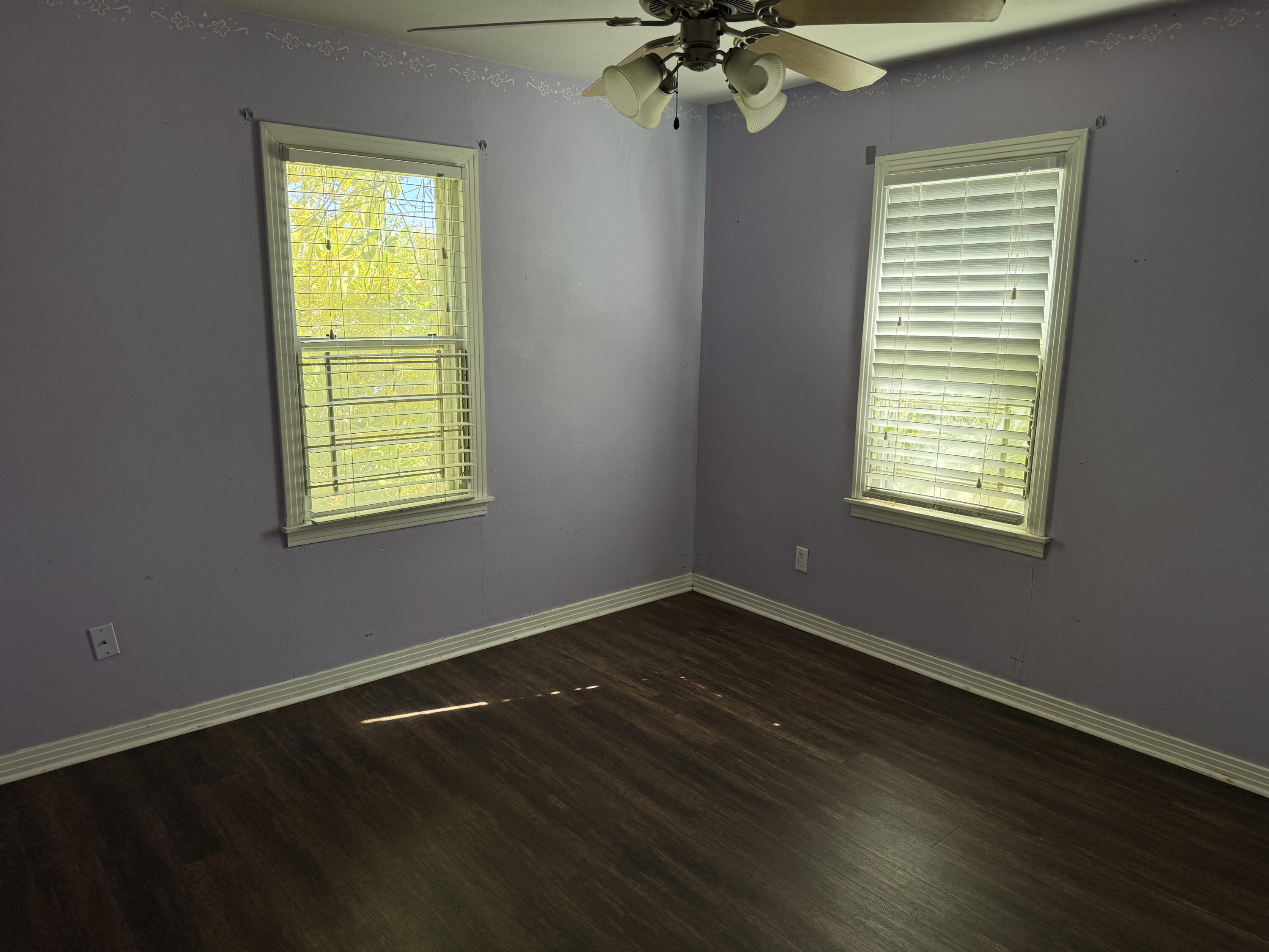 3103 Harvard Street Lubbock, TX 79415 - Photo 6 of 16 an empty room with a window
