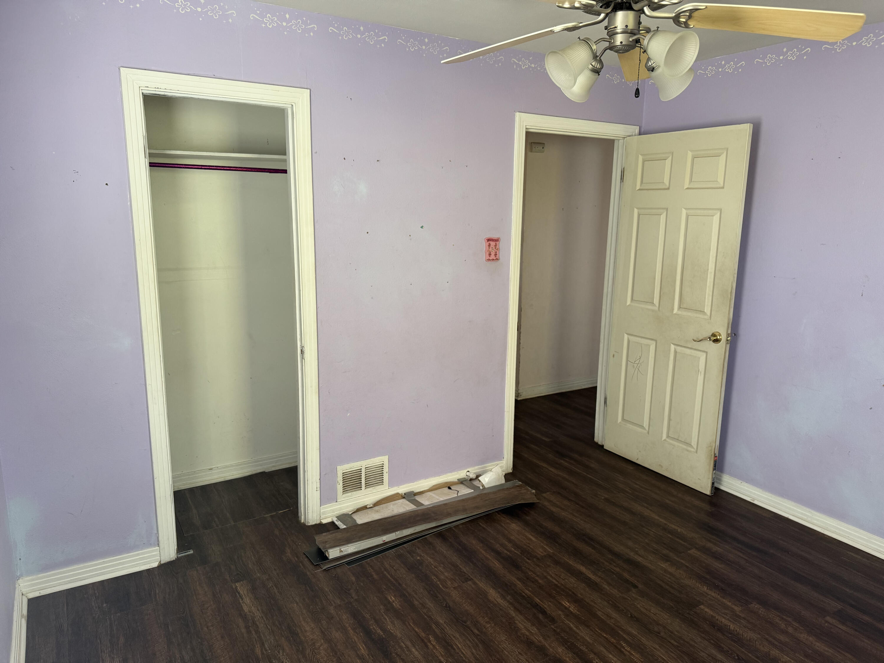 3103 Harvard Street Lubbock, TX 79415 - Photo 7 of 16 a view of a room with wooden floor