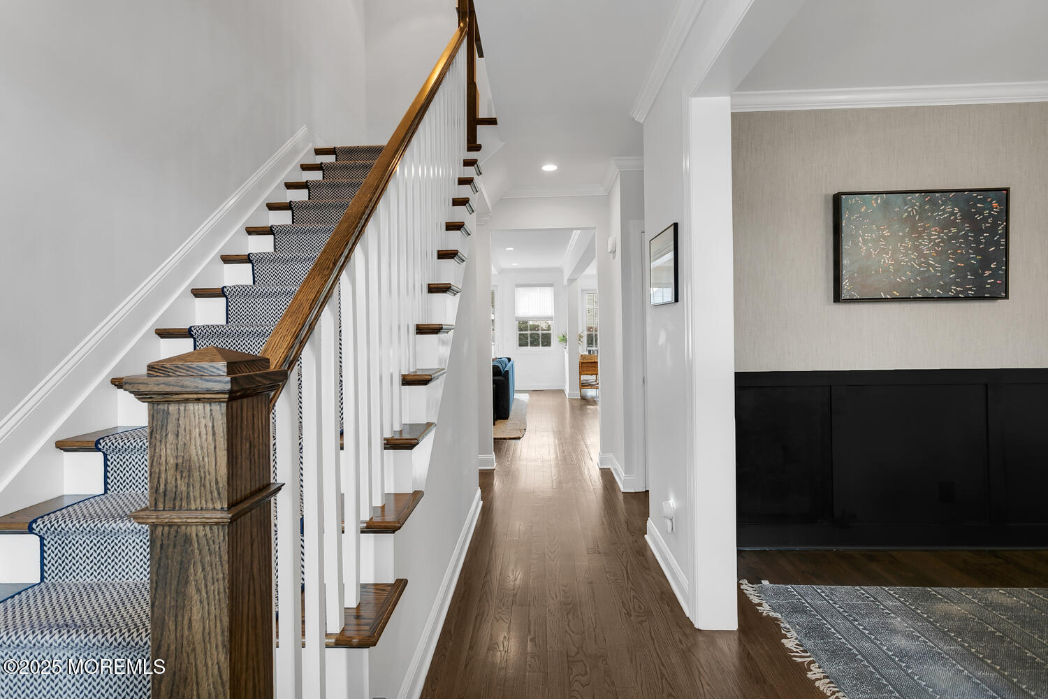 86 Washington Street Rumson, NJ 07760 - Photo 11 of 43 a view of a hallway with wooden floor and staircase