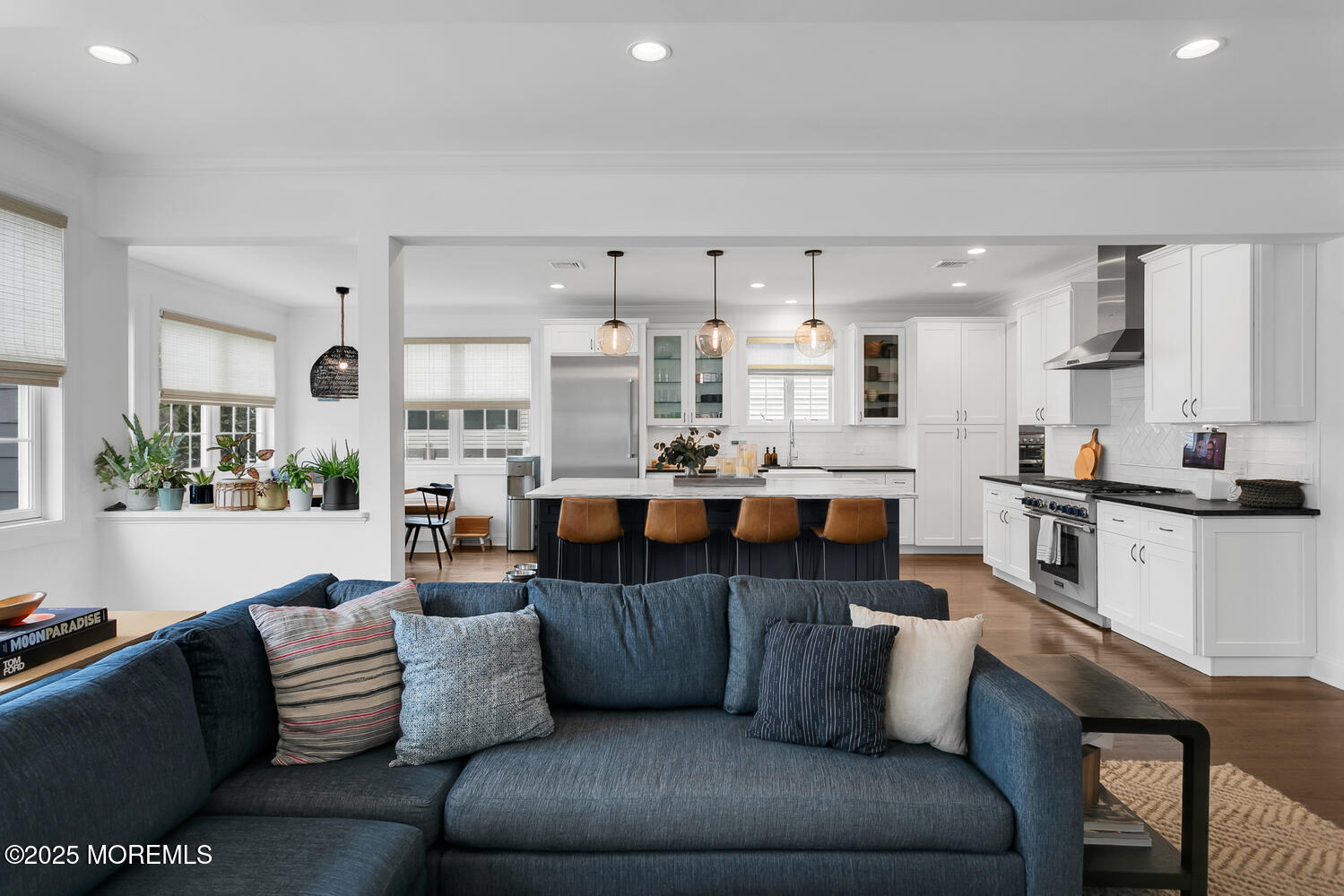 86 Washington Street Rumson, NJ 07760 - Photo 16 of 43 a living room with furniture kitchen and a chandelier