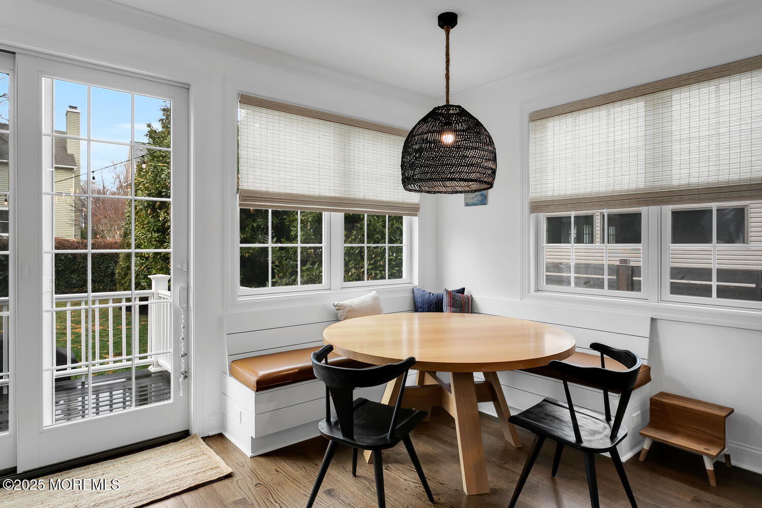 86 Washington Street Rumson, NJ 07760 - Photo 19 of 43 a view of a dining room with furniture window and wooden floor