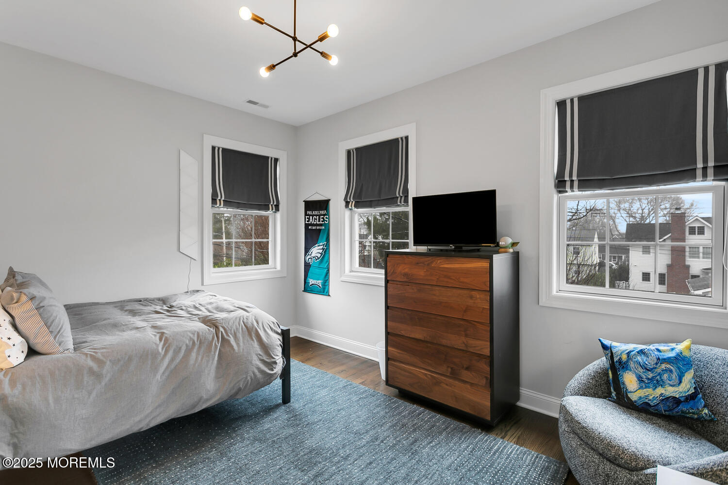 86 Washington Street Rumson, NJ 07760 - Photo 26 of 43 a bedroom with furniture and a flat screen tv