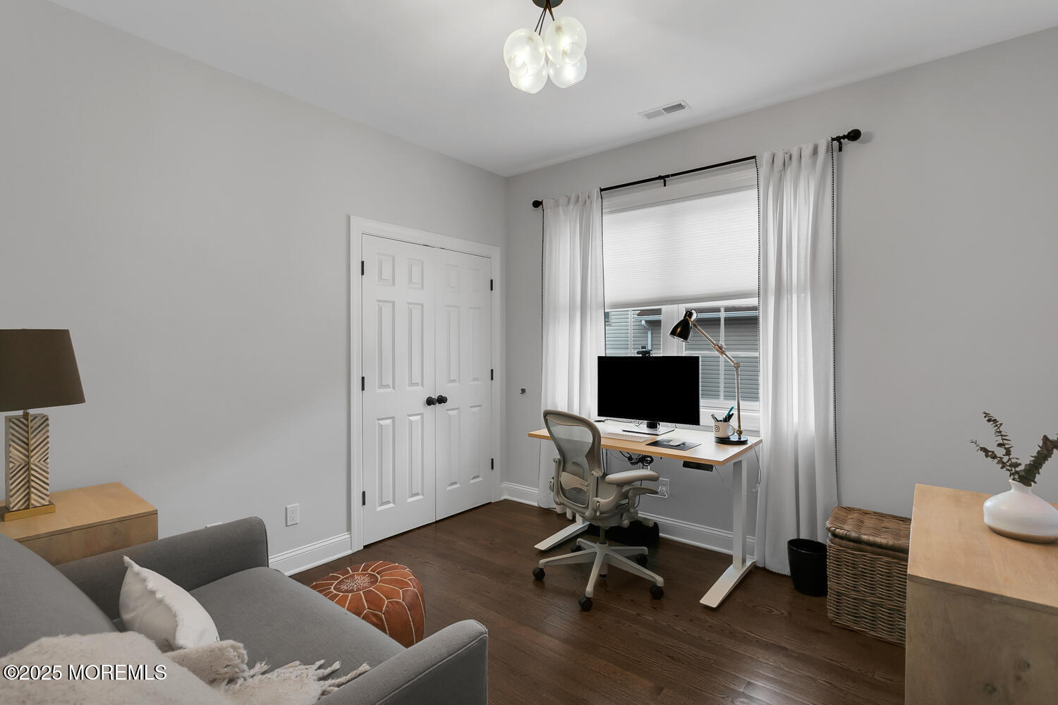 86 Washington Street Rumson, NJ 07760 - Photo 27 of 43 a view of a livingroom with workspace and a couch