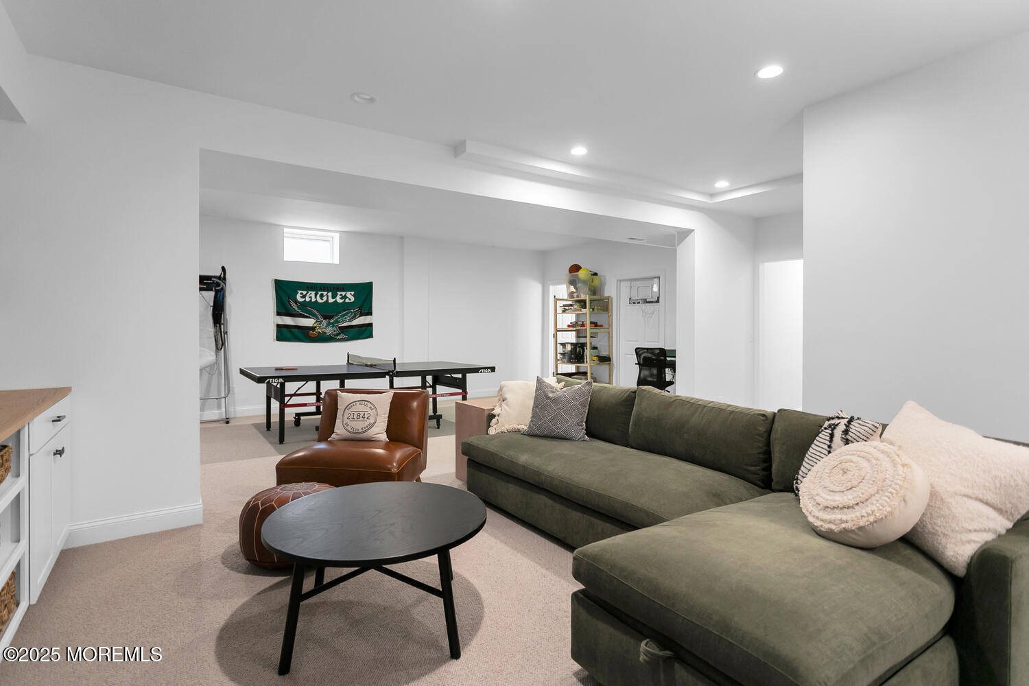 86 Washington Street Rumson, NJ 07760 - Photo 34 of 43 a living room with furniture and a wooden floor