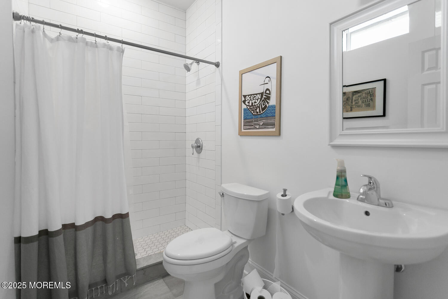 86 Washington Street Rumson, NJ 07760 - Photo 37 of 43 a bathroom with a sink and toilet