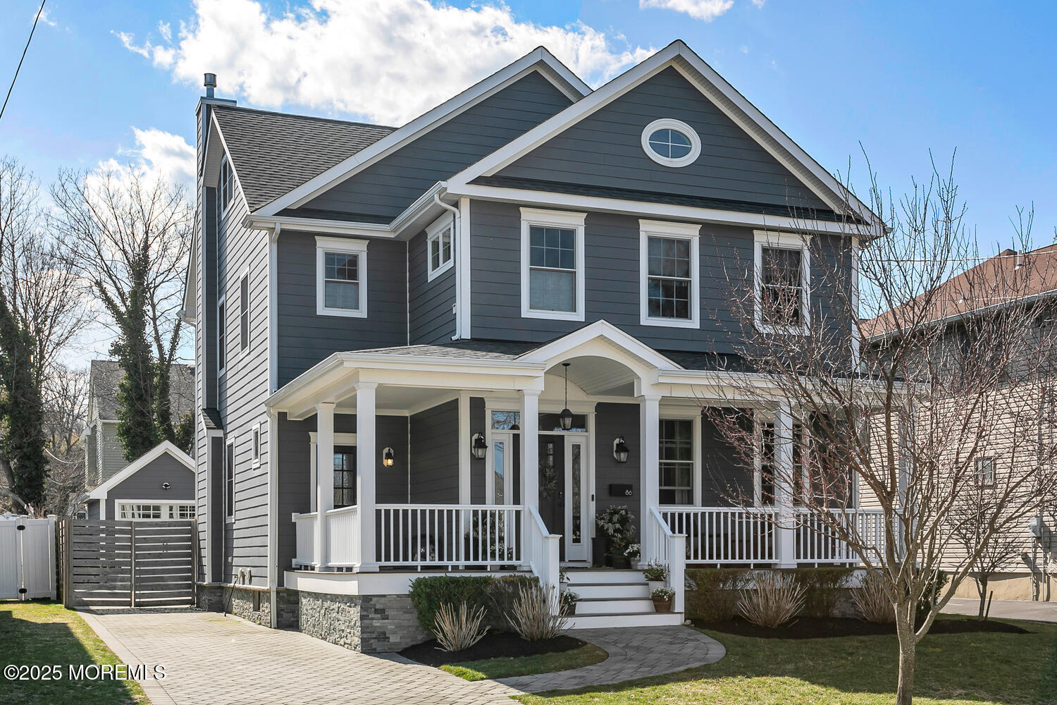 86 Washington Street Rumson, NJ 07760 - Photo 4 of 43 a front view of a house with a yard