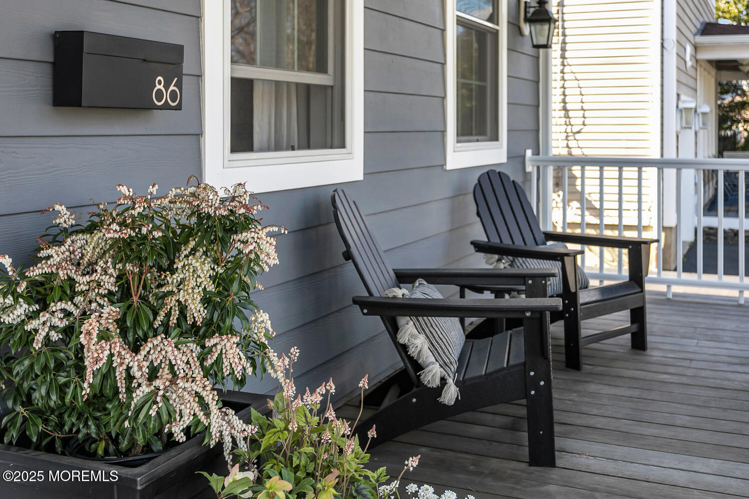 86 Washington Street Rumson, NJ 07760 - Photo 10 of 43 a patio with table and chairs