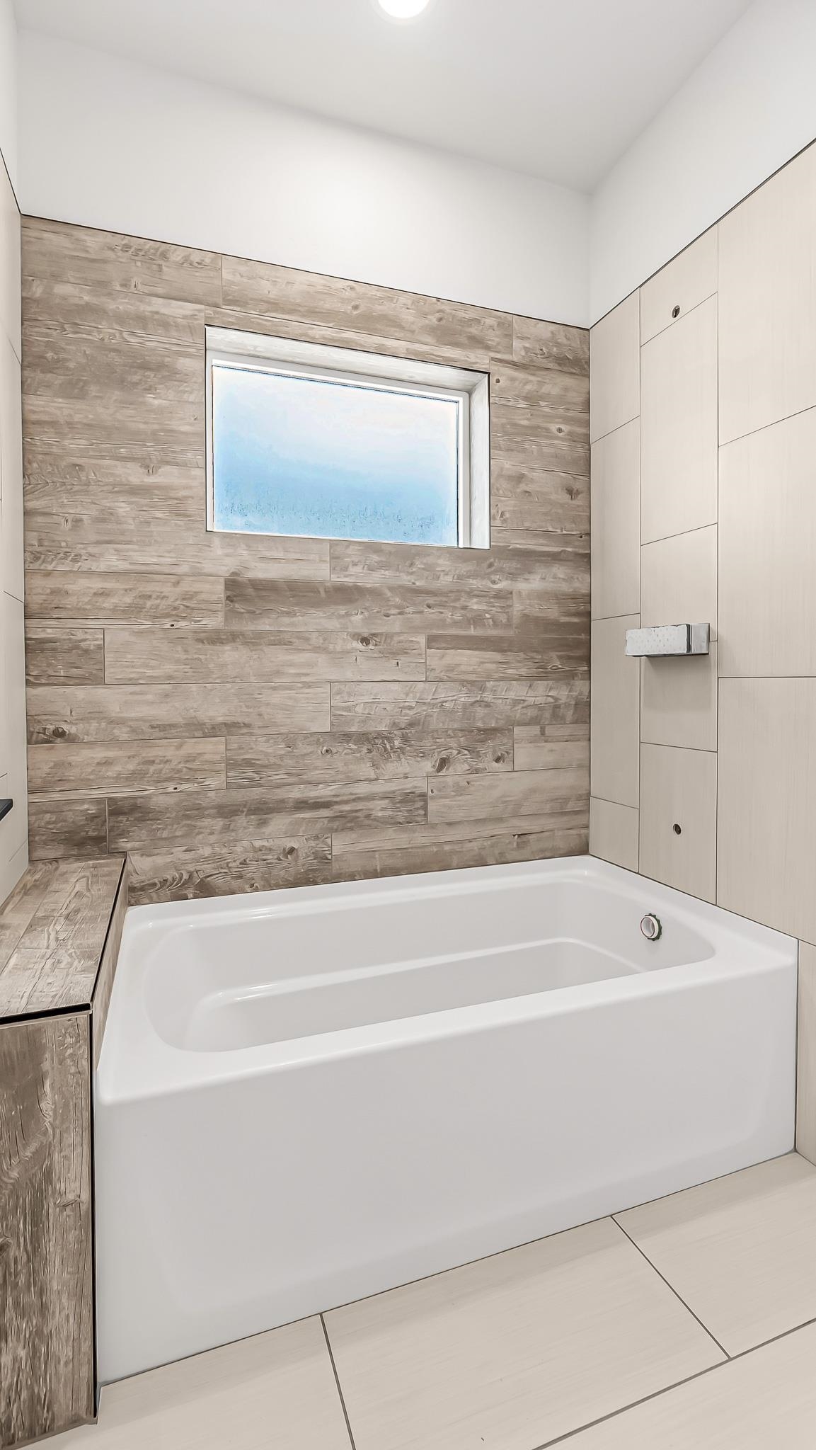 214 Limberpine Circle Parachute, CO 81635 - Photo 14 of 24 a bathroom with bathtub