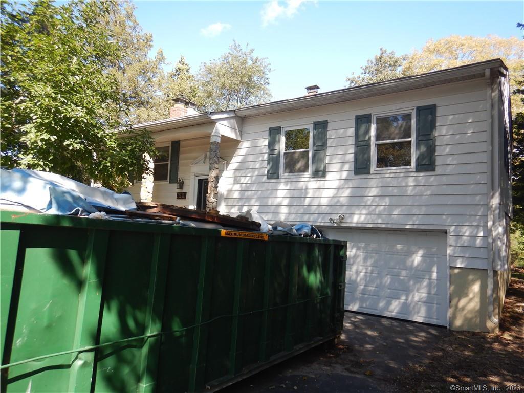 150 Glenwood Road Clinton, CT 06413 - Photo 1 of 1 a front view of house with yard and green space