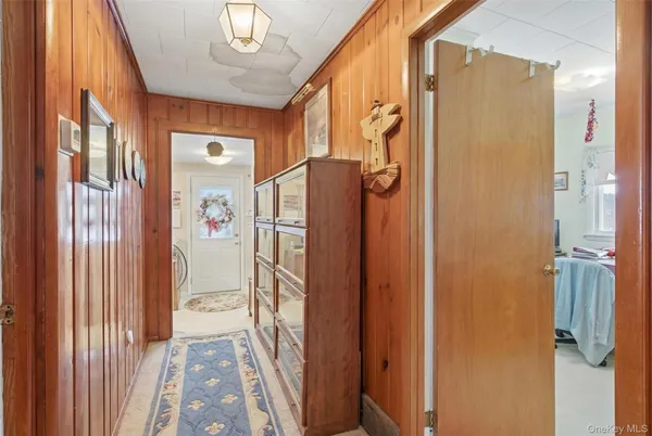 a bathroom with a shower and a mirror