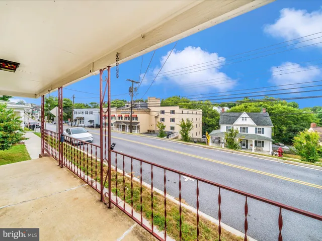 a view of a street from a balcony