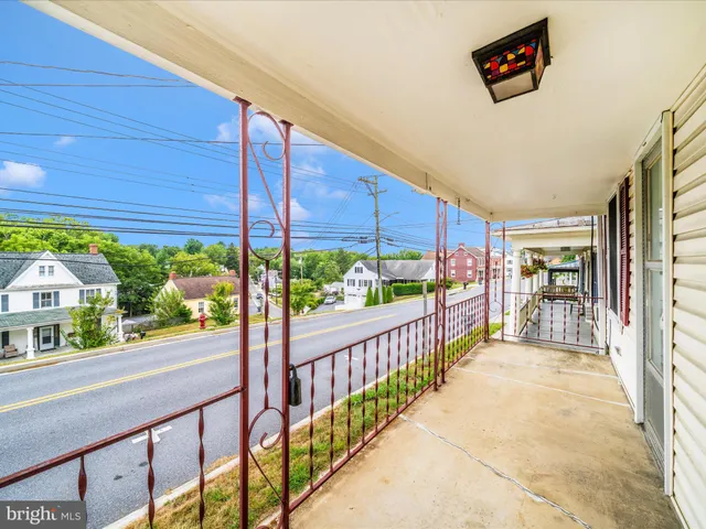 a view of a street from a balcony