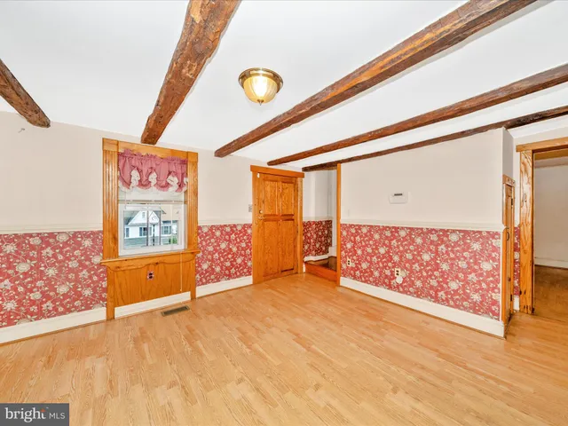 a view of an empty room with window