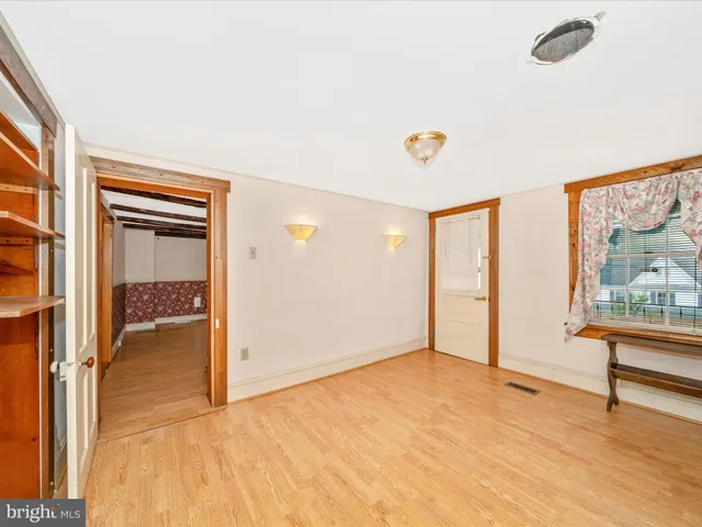 an empty room with window