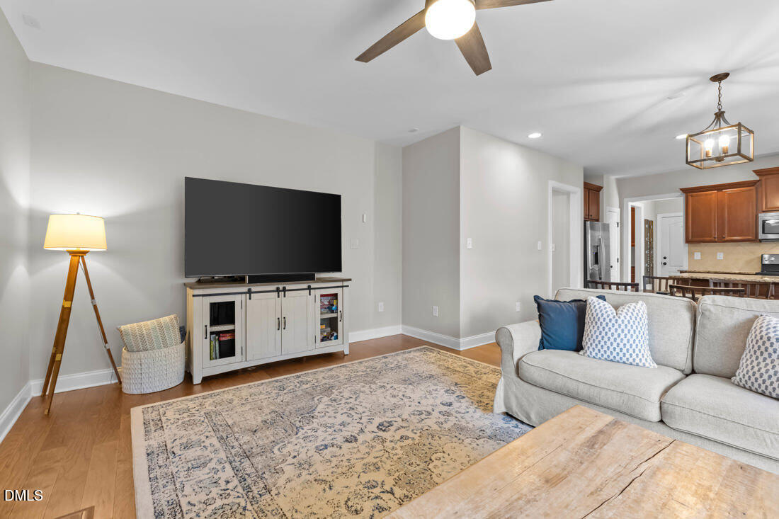 170 Valley Pines Circle Spring Lake, NC 28390 - Photo 24 of 55 a living room with furniture and a flat screen tv