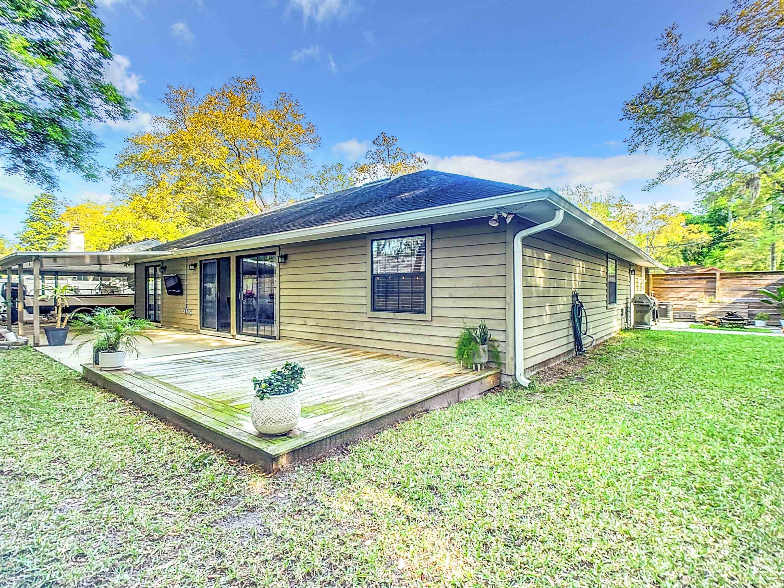 136 Pelican Road St. Augustine, FL 32086 - Photo 38 of 45 a view of a house with backyard