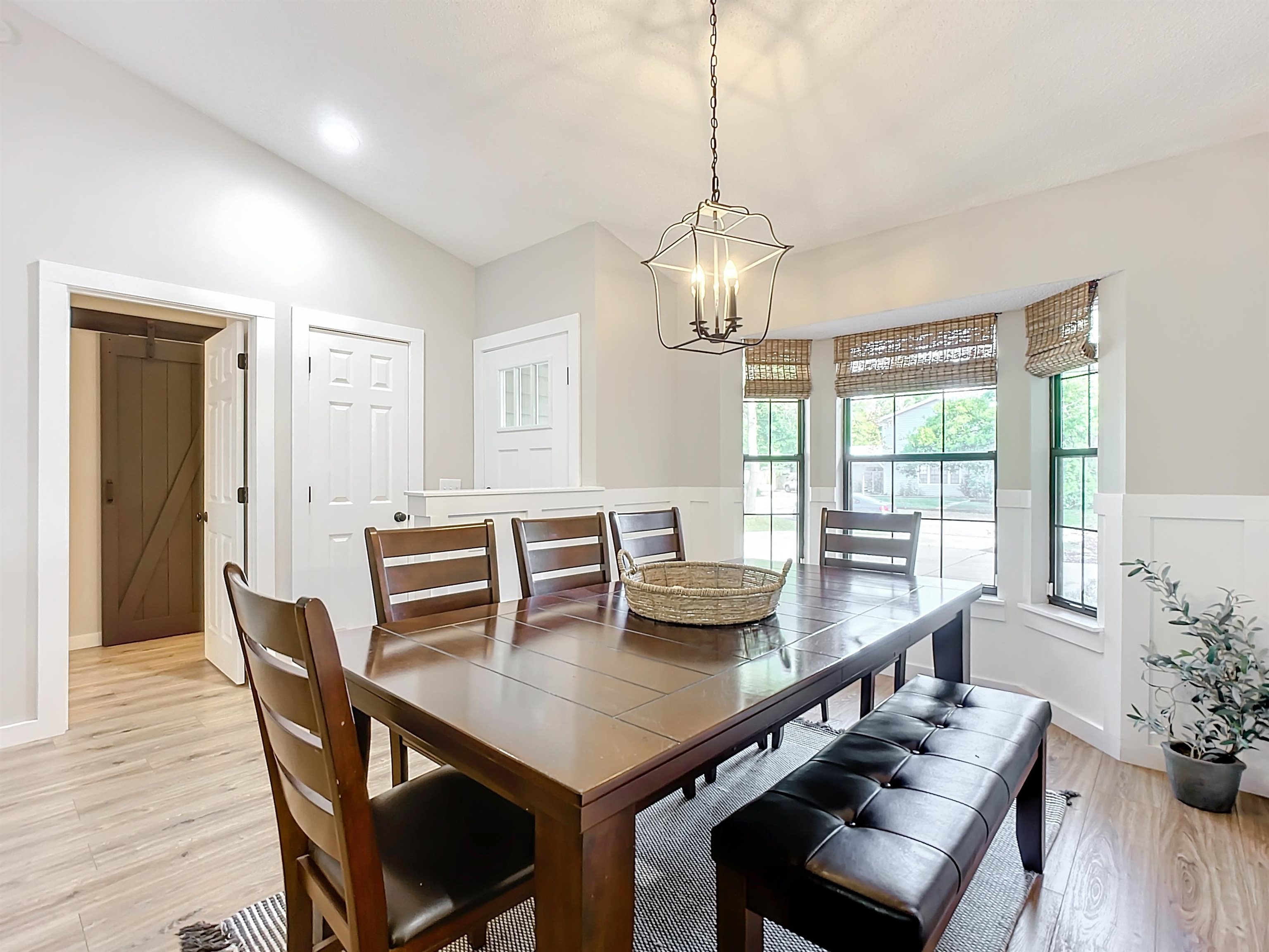 136 Pelican Road St. Augustine, FL 32086 - Photo 8 of 45 a view of a dining room with furniture window and wooden floor