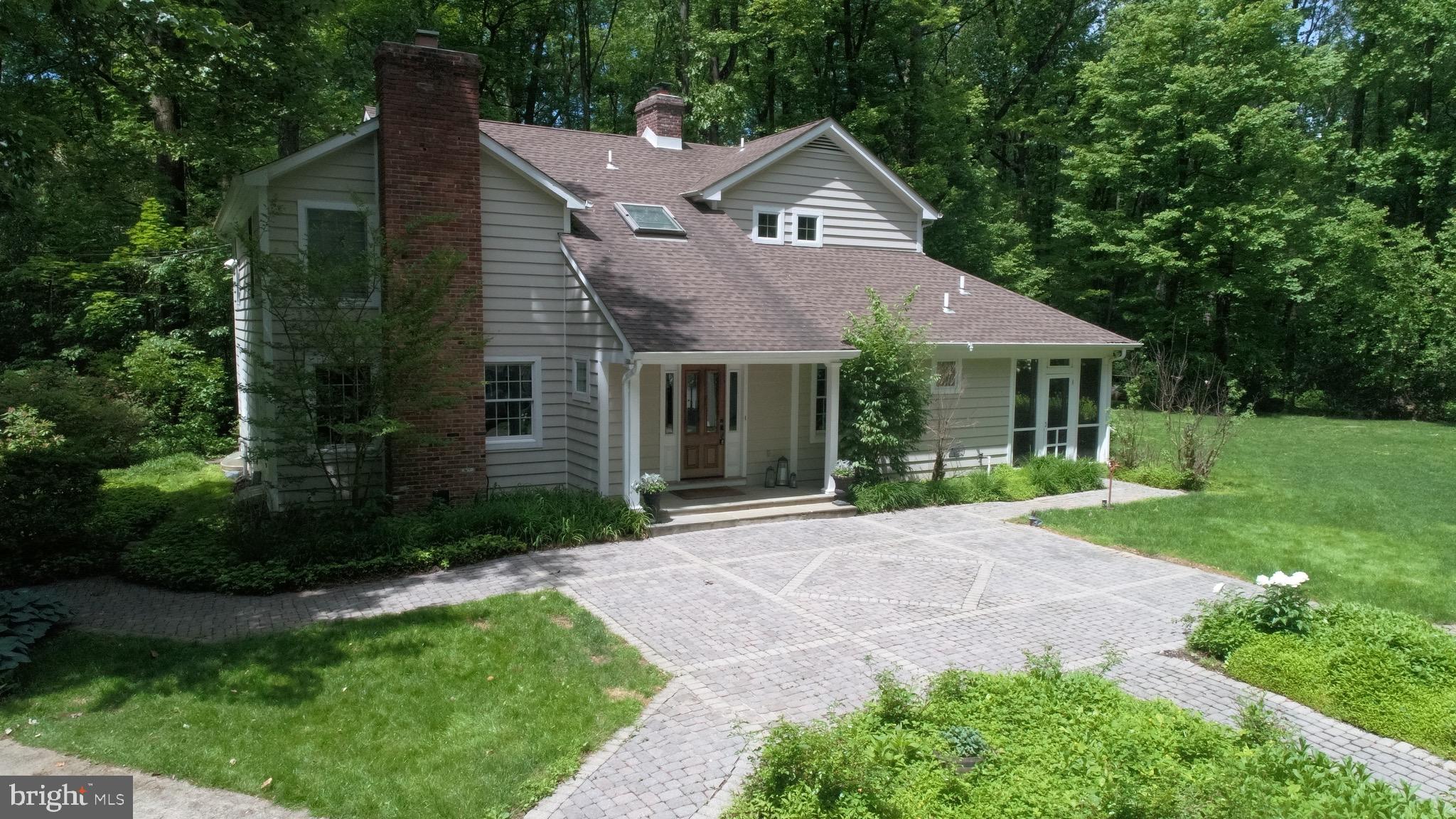 348 Mt Lucas Road Princeton, NJ 08540 - Photo 1 of 31 Paver walkway & patio in front yard from garage