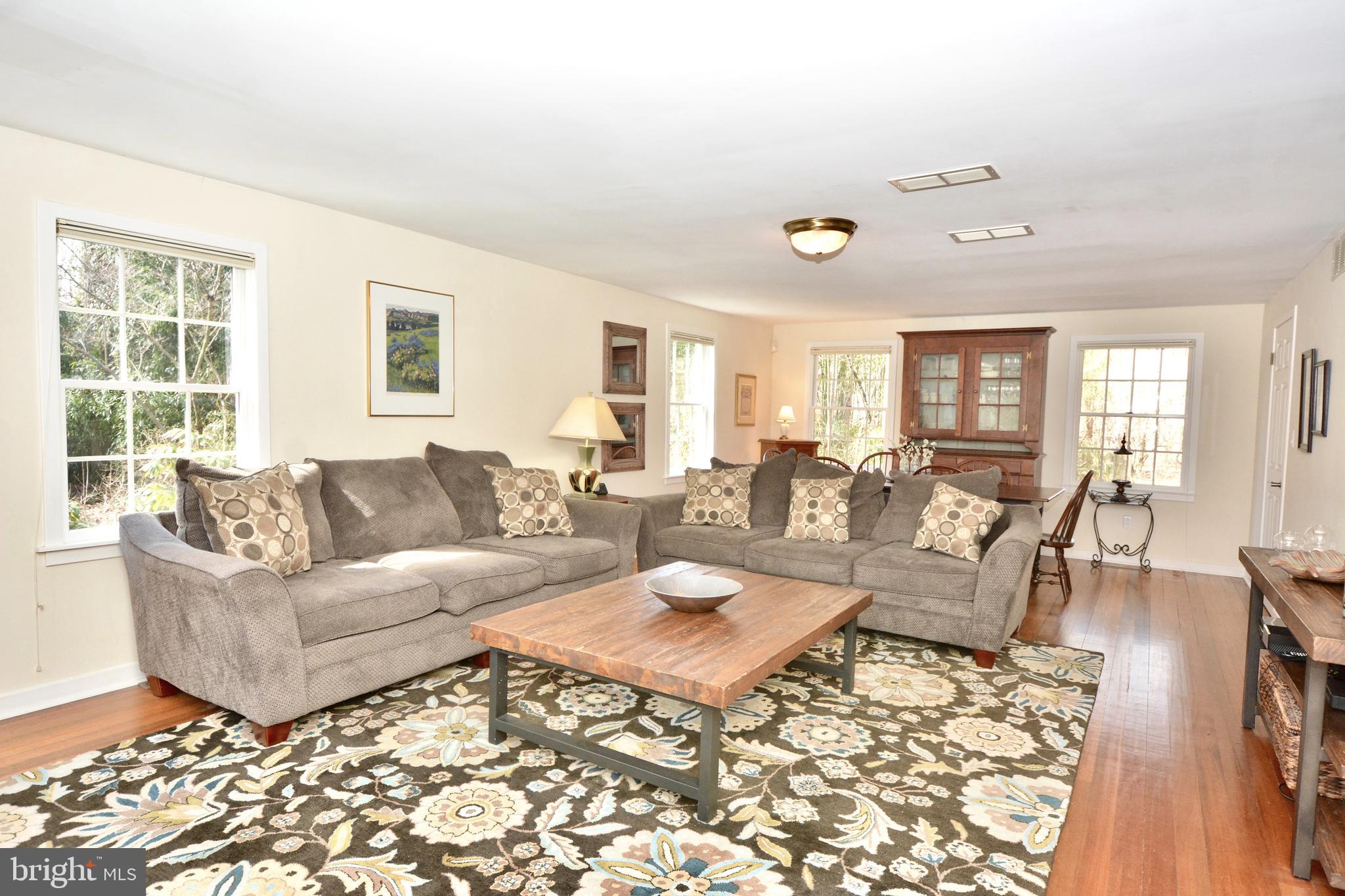 348 Mt Lucas Road Princeton, NJ 08540 - Photo 9 of 31 Living room with lots of windows and hardwood