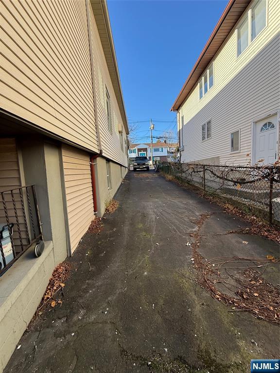 16 Corabelle Avenue Lodi, NJ 07644 - Photo 19 of 20 a view of a house with a street