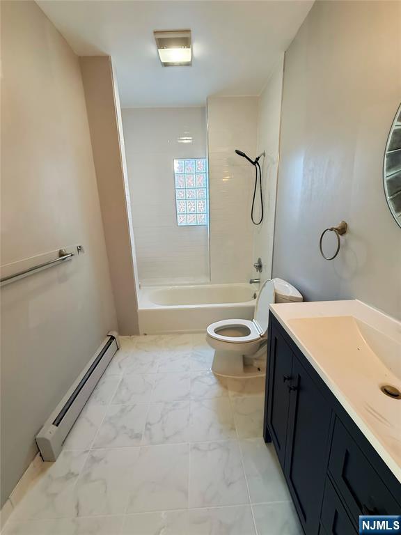 16 Corabelle Avenue Lodi, NJ 07644 - Photo 6 of 20 a bathroom with a granite countertop sink a toilet and shower