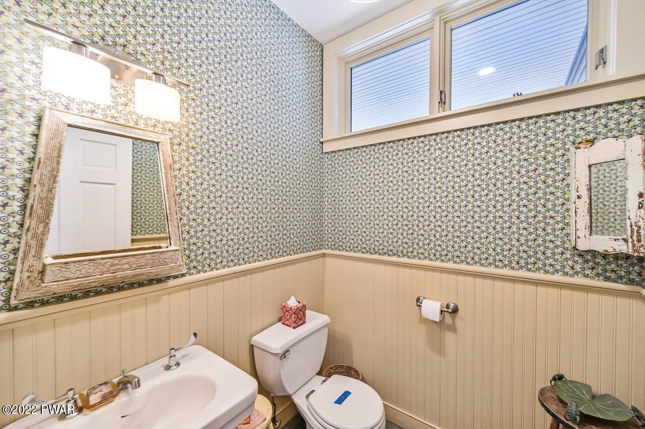 45 Tammany Flats Road Damascus, PA 18415 - Photo 35 of 73 a bathroom with a sink a toilet and a mirror