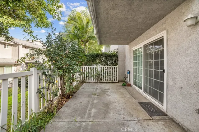an aerial view of a house with a lake view