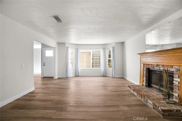 a bathroom with a sink toilet a mirror and vanity