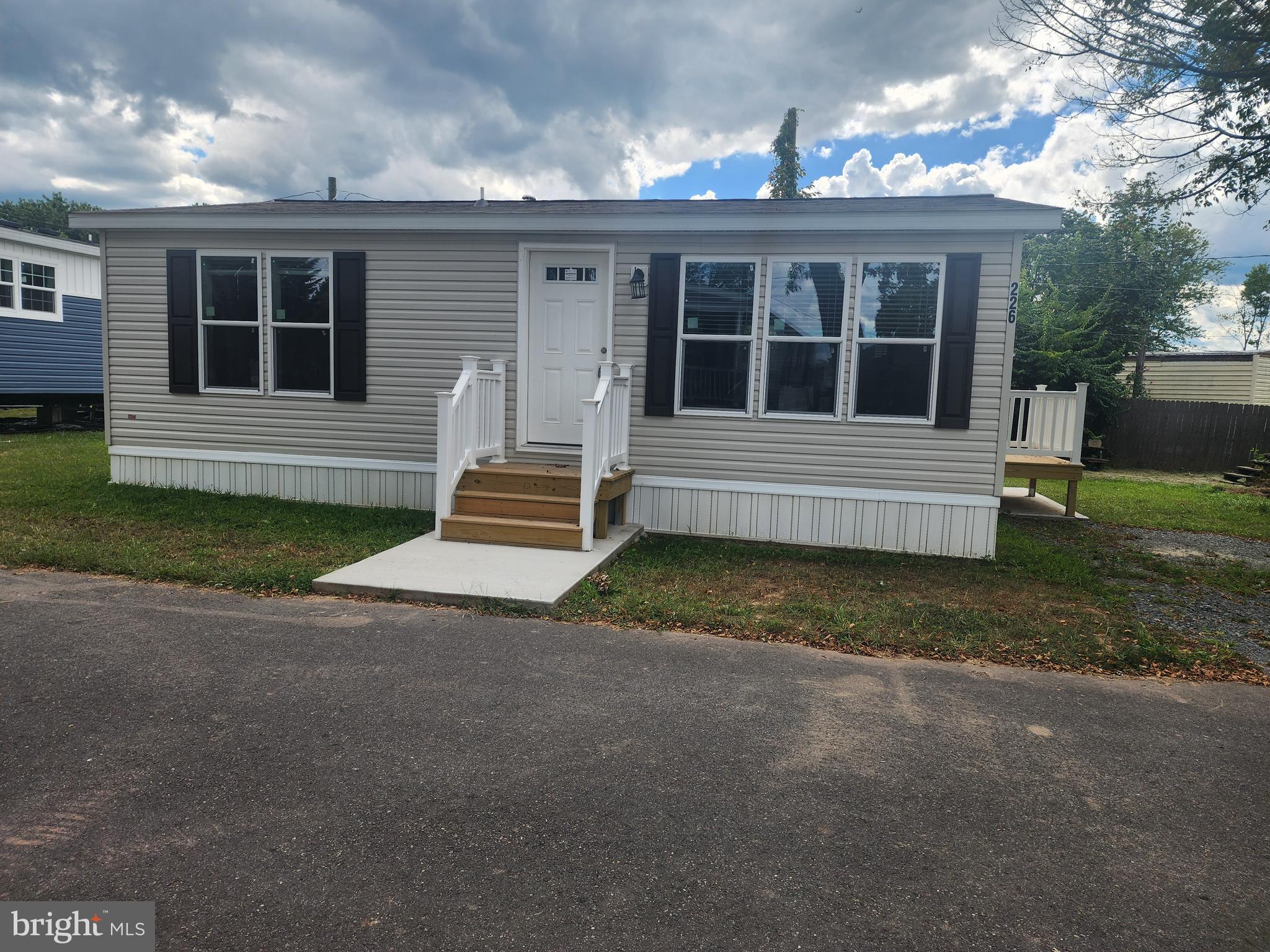 165 West Ridge Pike Limerick, PA 19468 - Photo 1 of 15 a front view of a house with a yard
