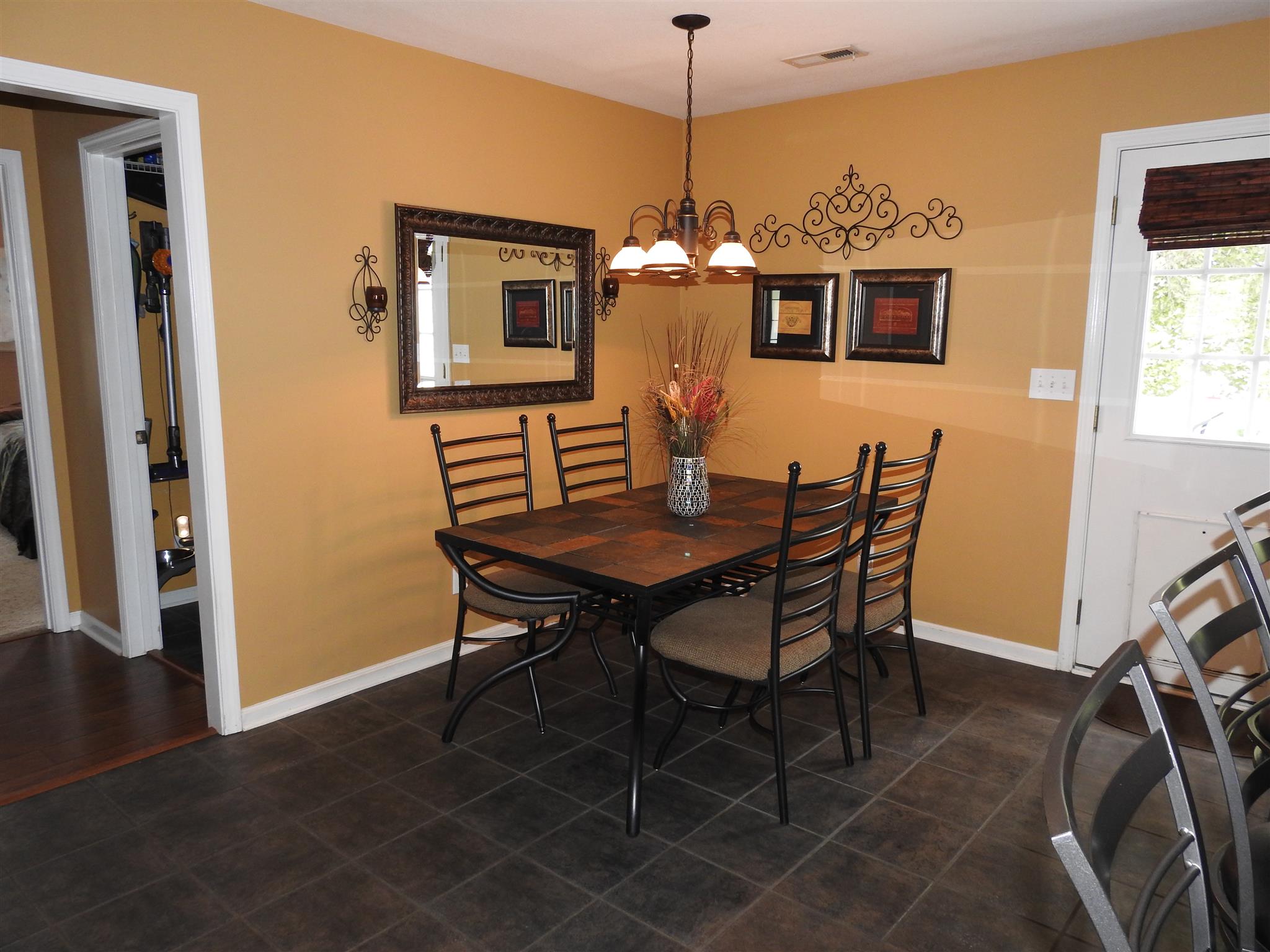 1040 Drake Road Clarksville, TN 37043 - Photo 9 of 29 a view of a dining room with furniture and wooden floor