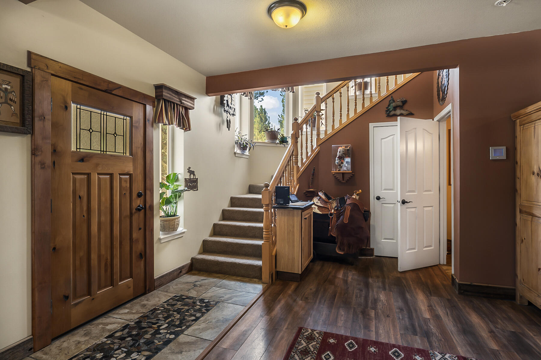 15730 Jackpine Road La Pine, OR 97739 - Photo 5 of 43 a view of entryway with wooden floor and stair