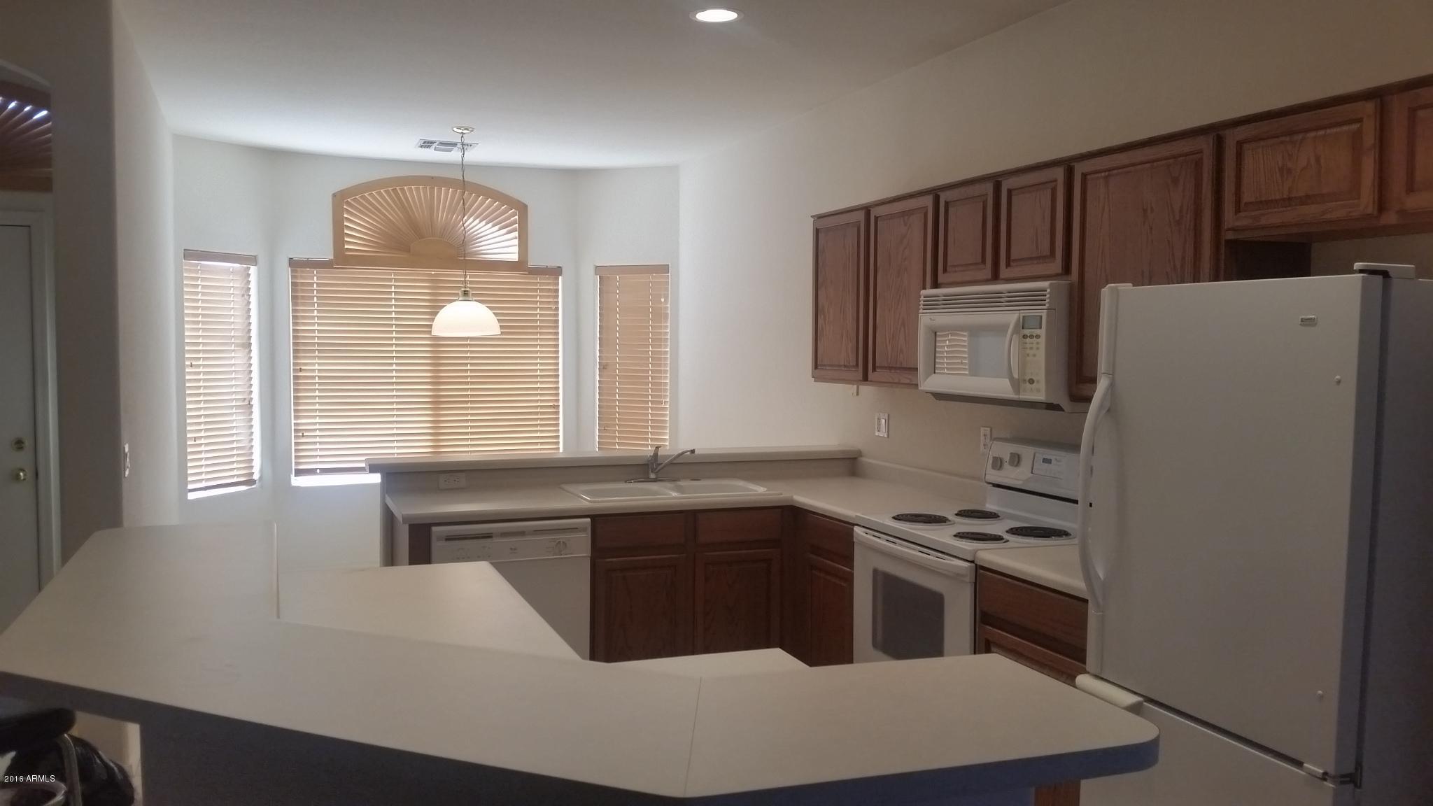 3495 South Sawmill Road Gilbert, AZ 85297 - Photo 3 of 23 03 Light and Bright Kitchen & Dining