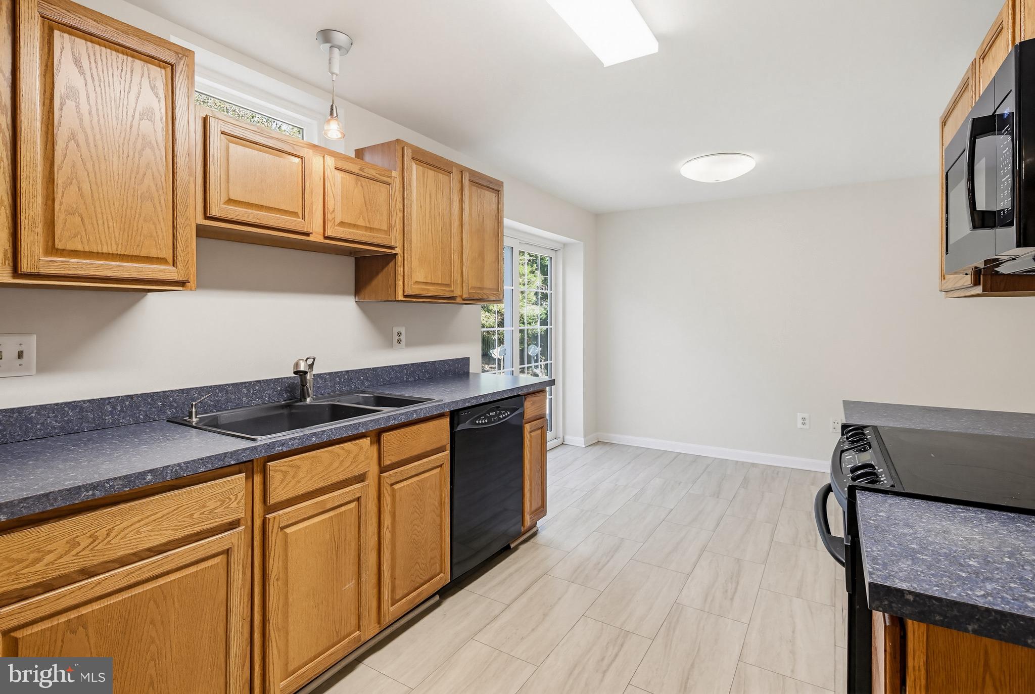 8266 Spring Branch Court Laurel, MD 20723 - Photo 49 of 73 Full kitchen in the lower level w/ a breakfast rm