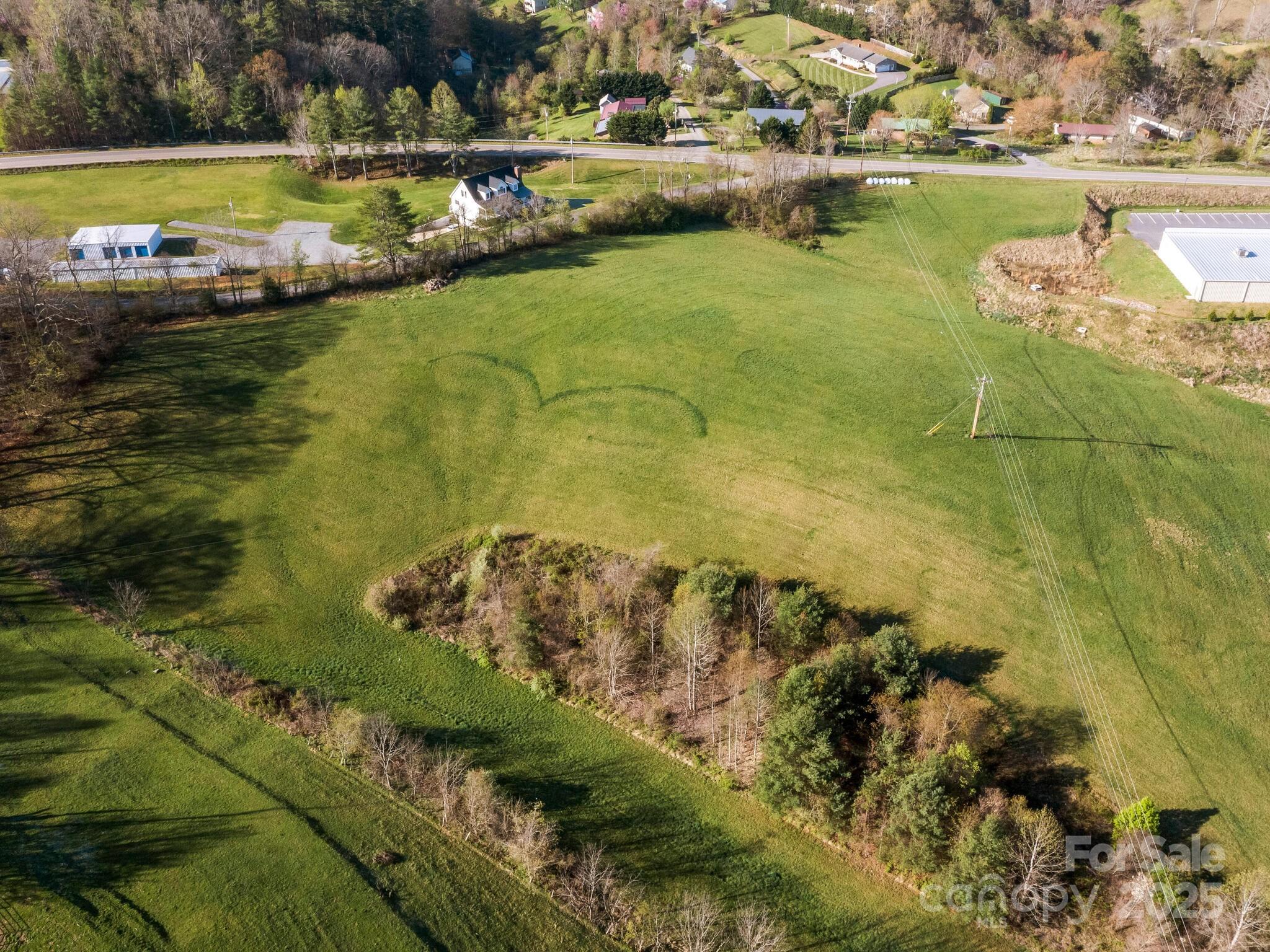 99999 Sprouse Town Road Weaverville, NC 28787 - Photo 12 of 20 an aerial view of a residential building with beach and outdoor space