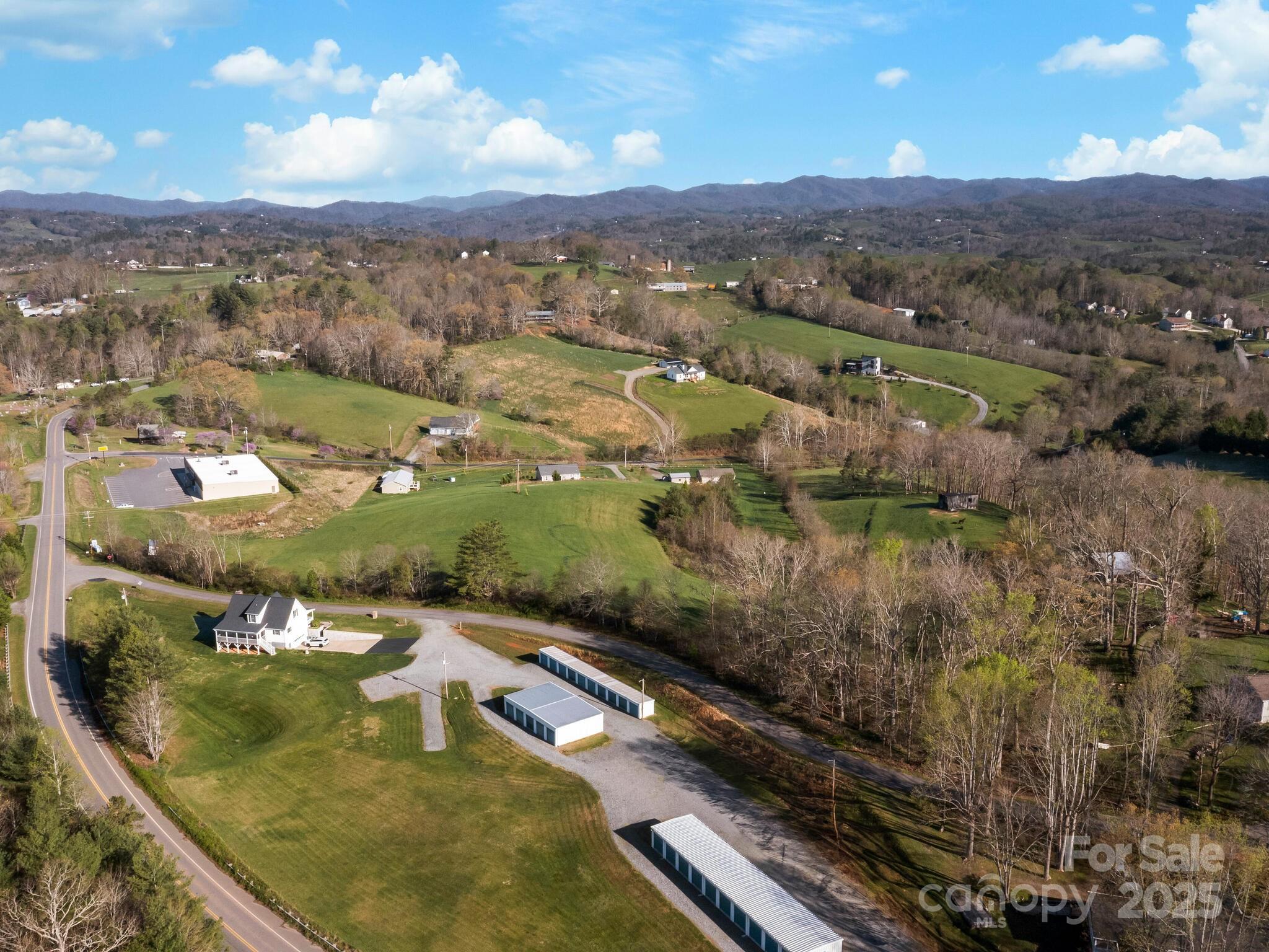 99999 Sprouse Town Road Weaverville, NC 28787 - Photo 13 of 20 an aerial view of residential houses with outdoor space