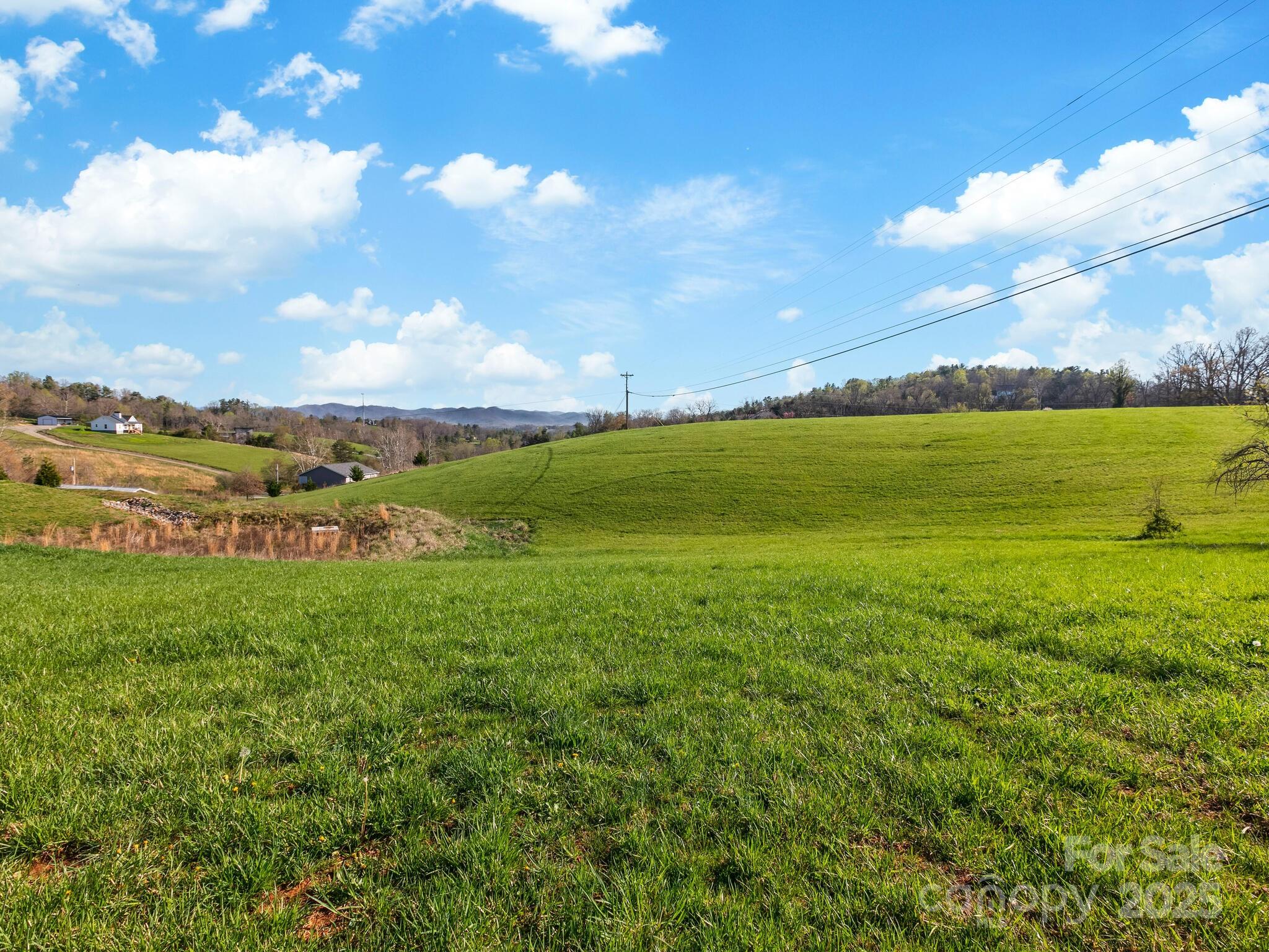 99999 Sprouse Town Road Weaverville, NC 28787 - Photo 14 of 20 a view of an ocean and a mountain