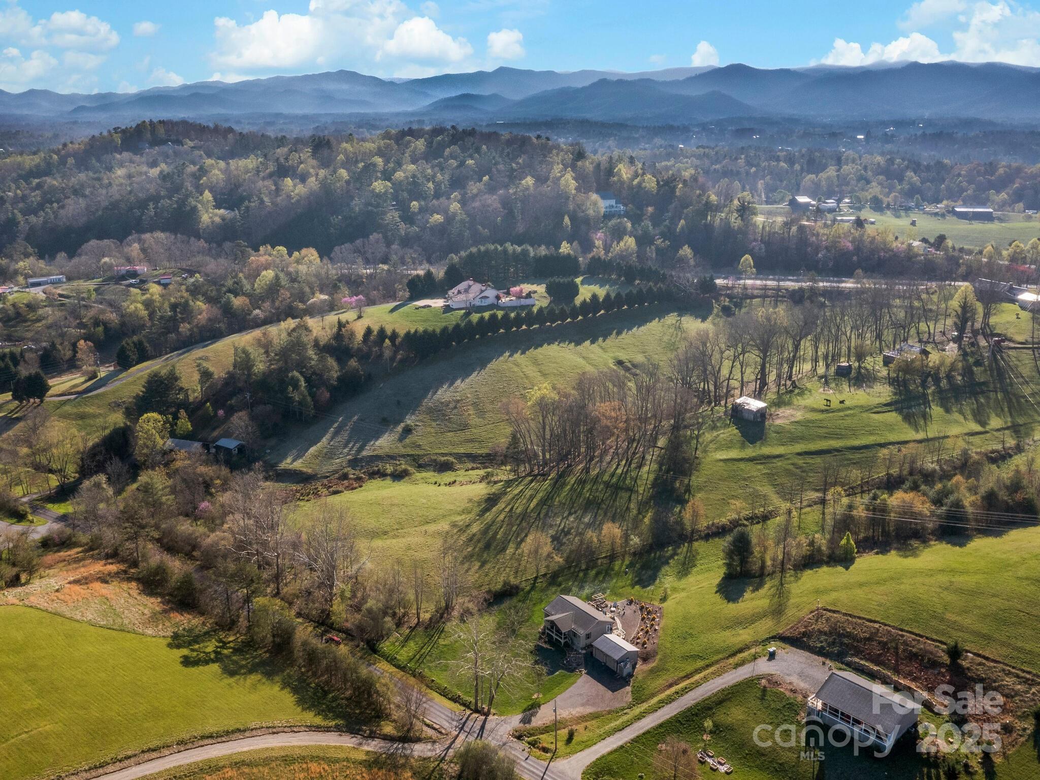 99999 Sprouse Town Road Weaverville, NC 28787 - Photo 8 of 20 a view of a lake in middle of the town