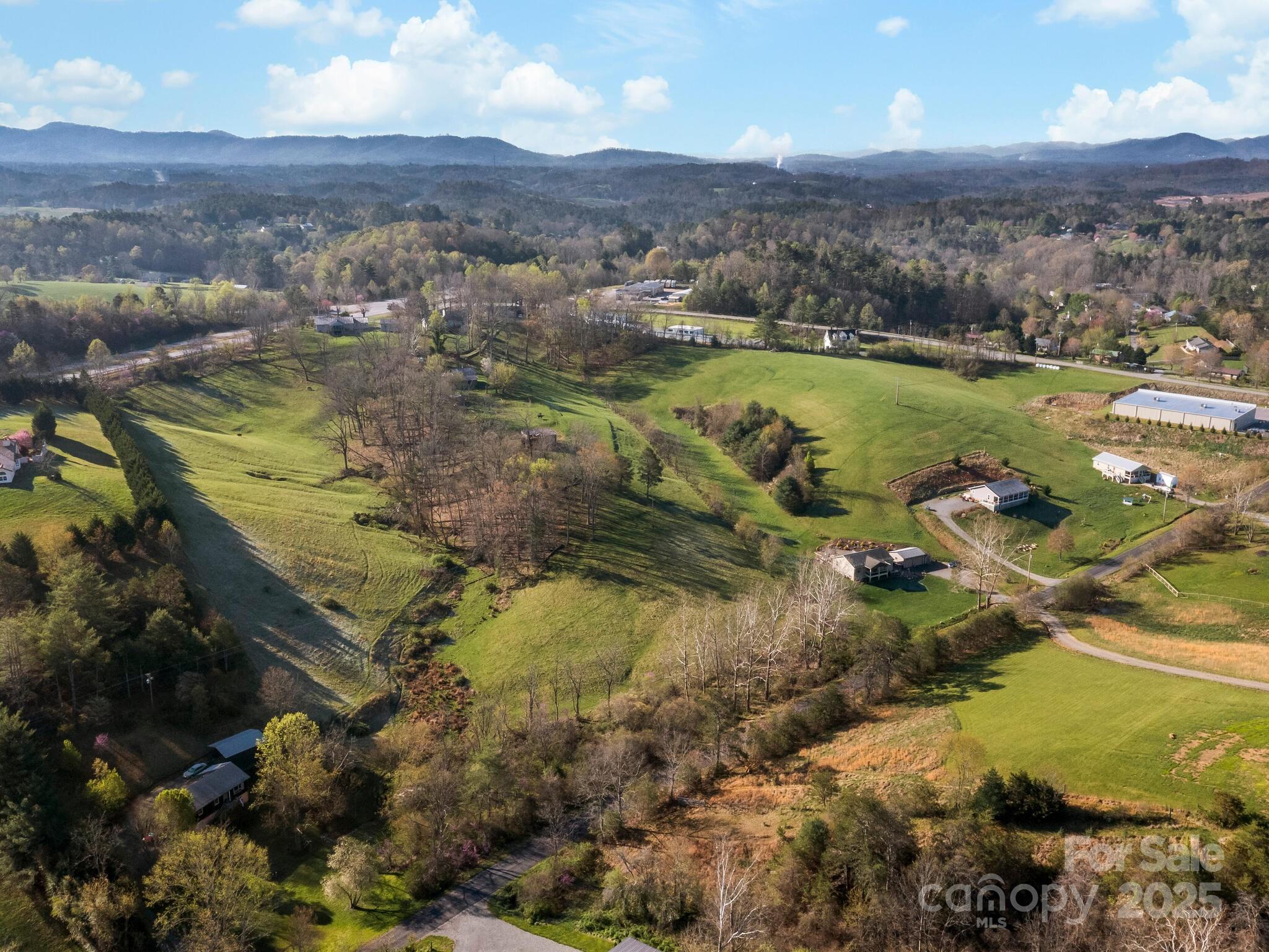 99999 Sprouse Town Road Weaverville, NC 28787 - Photo 9 of 20 a view of a city with mountains in the background