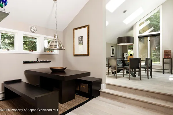 a view of a dining room with furniture