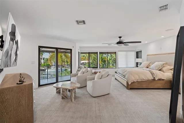 a bed room with a bed and a couch