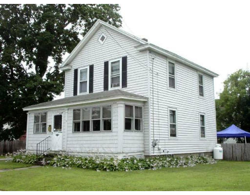 34 Ruggles Street Three Rivers, MA 01080 - Photo 1 of 10 a front view of a house with a yard