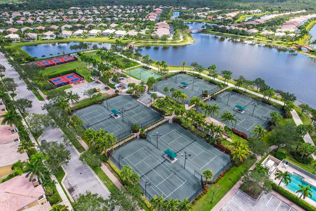 an aerial view of a houses with outdoor space
