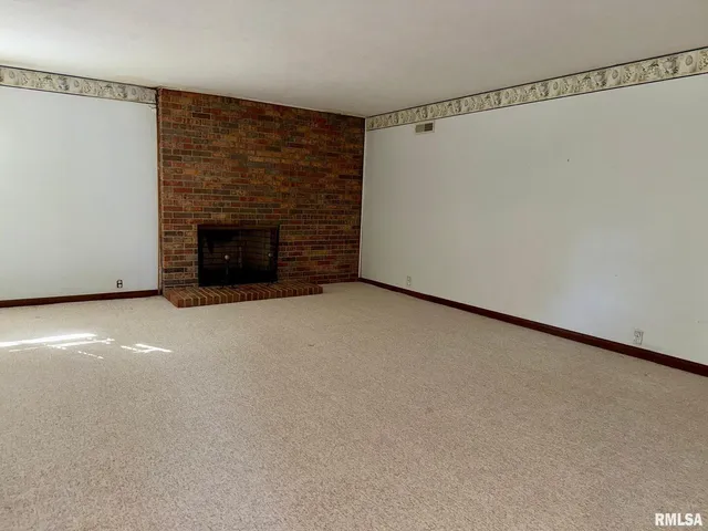 a view of a room with a glass door and shower curtain