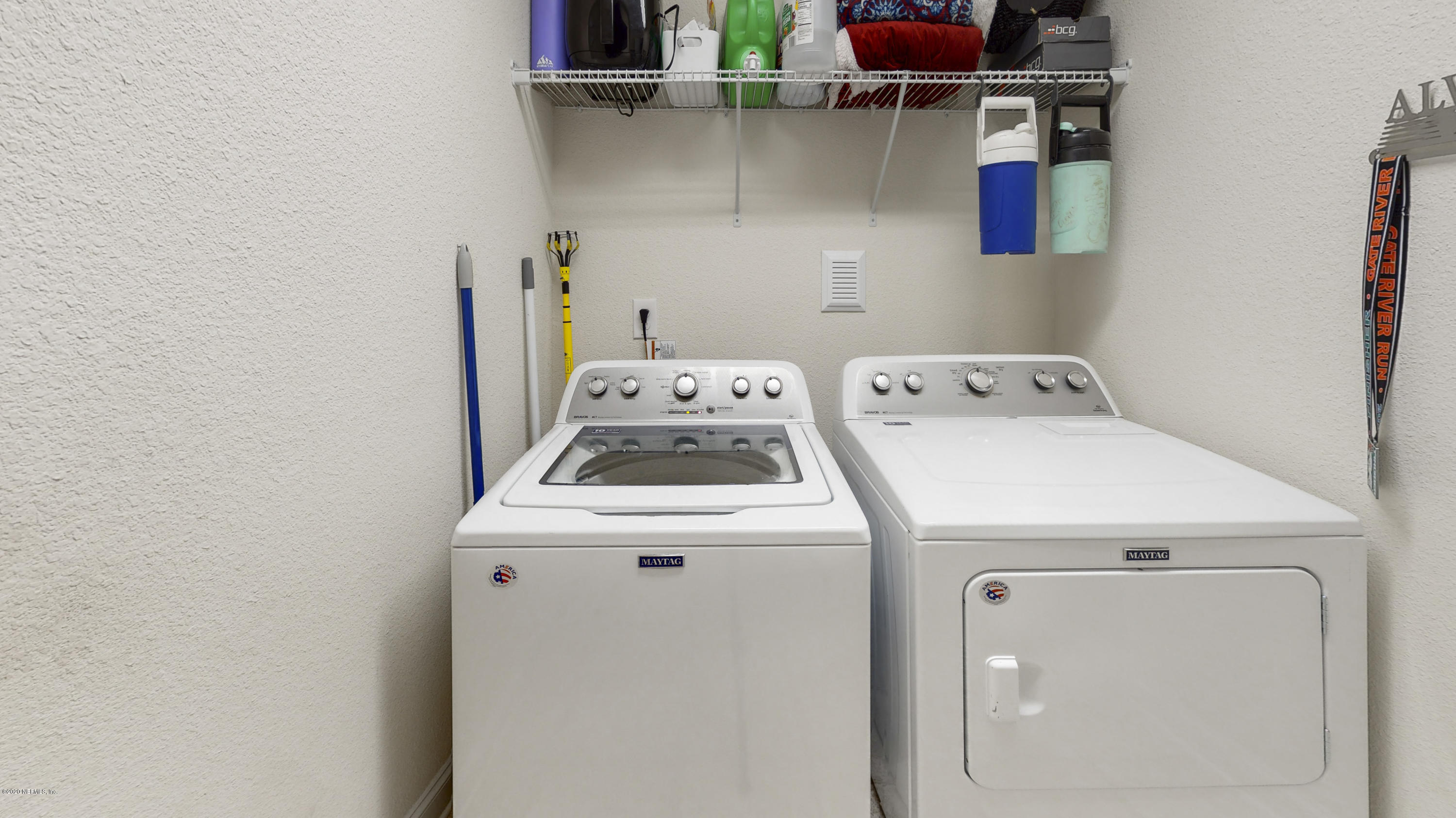 88101 Maybourne Road Yulee, FL 32097 - Photo 20 of 22 a utility room with dryer and washer